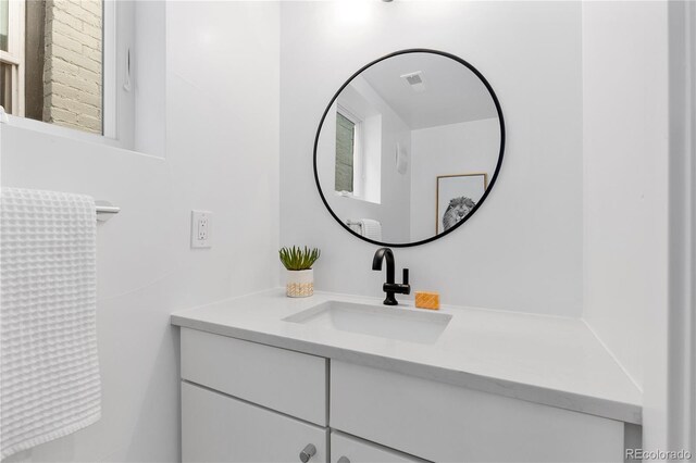 3725 N Franklin St, Denver, CO 80205 - bathroom with visible vents and vanity