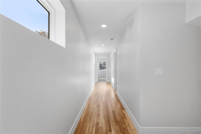 3725 N Franklin St, Denver, CO 80205 - corridor with light wood-type flooring, recessed lighting, baseboards, and visible vents