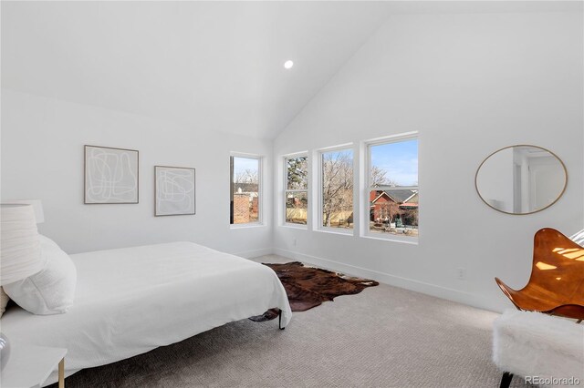 3725 N Franklin St, Denver, CO 80205 - carpeted bedroom featuring recessed lighting, baseboards, high vaulted ceiling, and multiple windows