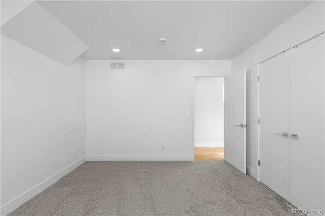 3725 N Franklin St, Denver, CO 80205 - unfurnished room with baseboards, recessed lighting, visible vents, and light colored carpet