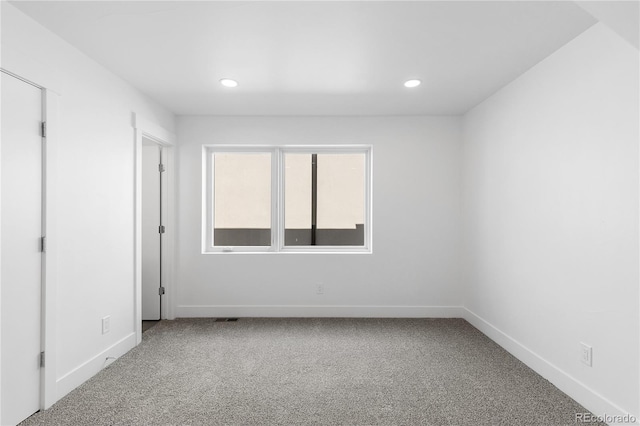 3725 N Franklin St, Denver, CO 80205 - empty room with carpet flooring, baseboards, and recessed lighting
