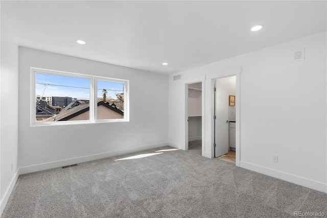 3725 N Franklin St, Denver, CO 80205 - unfurnished bedroom featuring baseboards, recessed lighting, visible vents, and carpet floors