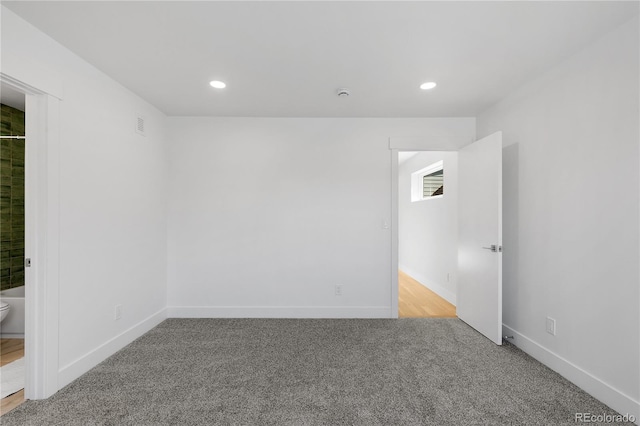 3725 N Franklin St, Denver, CO 80205 - unfurnished room with light carpet, baseboards, visible vents, and recessed lighting