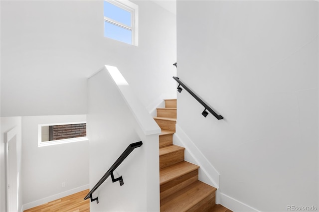 3725 N Franklin St, Denver, CO 80205 - stairs featuring baseboards and wood finished floors