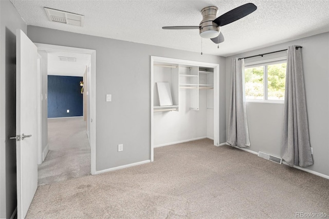 6353 W 78th Ave, Arvada, CO 80003 - unfurnished bedroom with carpet, a textured ceiling, a closet, and ceiling fan