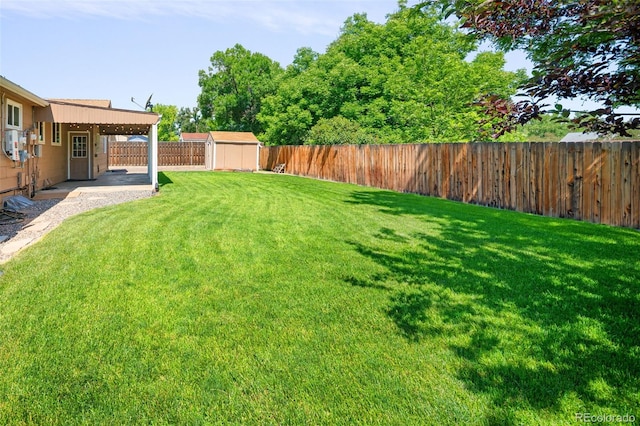 6353 W 78th Ave, Arvada, CO 80003 - fenced backyard with a shed