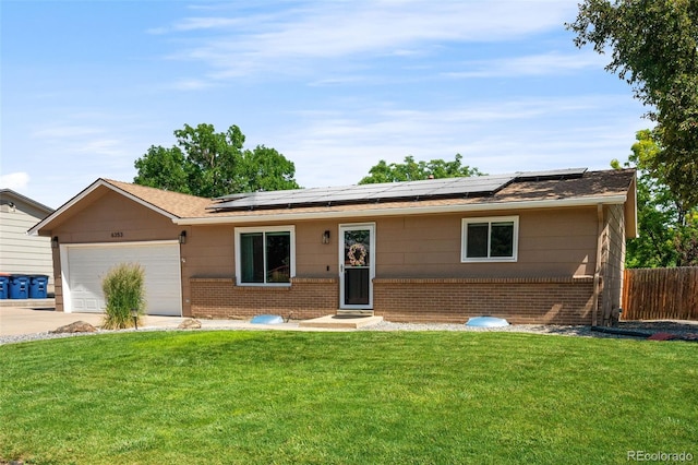 6353 W 78th Ave, Arvada, CO 80003 - ranch-style house featuring brick siding, a garage, solar panels, driveway, and a shingled roof