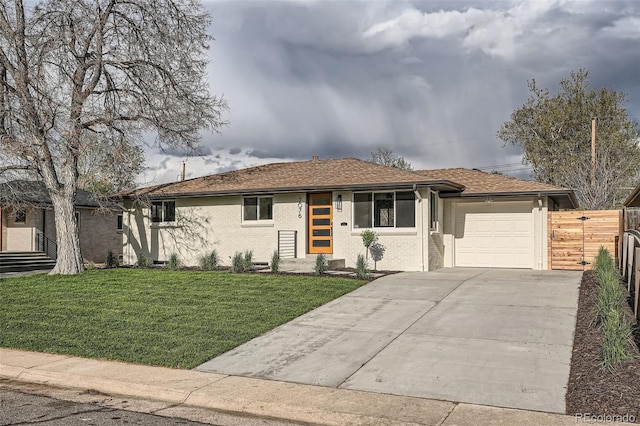 ranch-style home featuring driveway, a front yard, brick siding, fence, and an attached garage