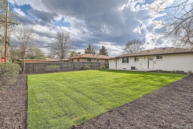 view of yard featuring a patio area and fence