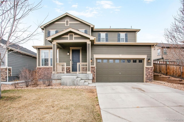 view of front of home with a garage, fence, and concrete driveway