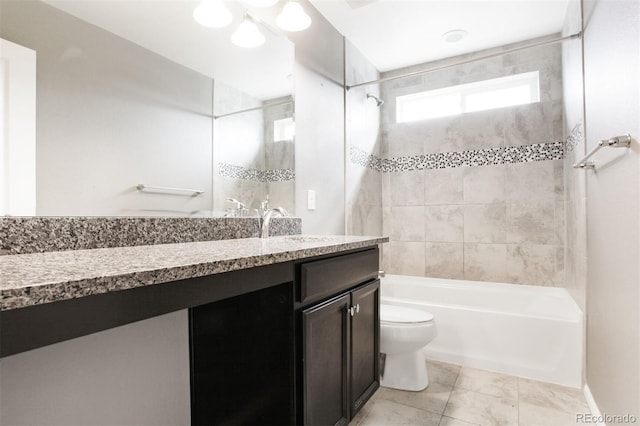 bathroom with vanity, toilet, and shower / tub combination