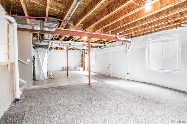 unfinished basement with stairway