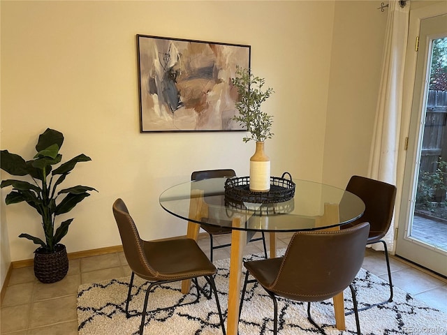 view of tiled dining space