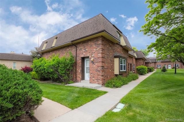 view of property exterior featuring a yard