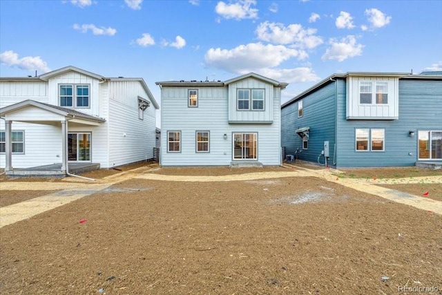 18998 E 94th Pl, Commerce City, CO 80022 - back of house featuring board and batten siding