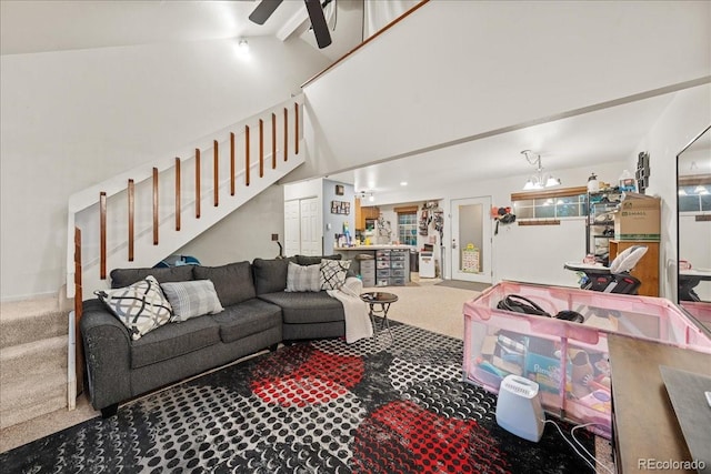 3531 Windmill Dr Unit M5, Fort Collins, CO 80526 - living area featuring carpet floors, stairs, a ceiling fan, high vaulted ceiling, and beamed ceiling