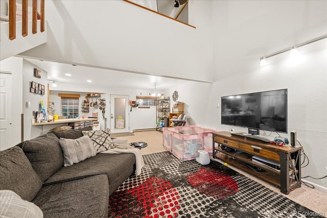 3531 Windmill Dr Unit M5, Fort Collins, CO 80526 - living area featuring a towering ceiling and carpet