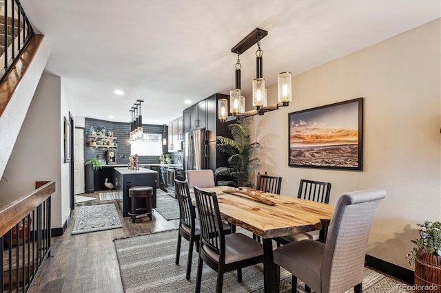 dining area featuring hardwood / wood-style floors