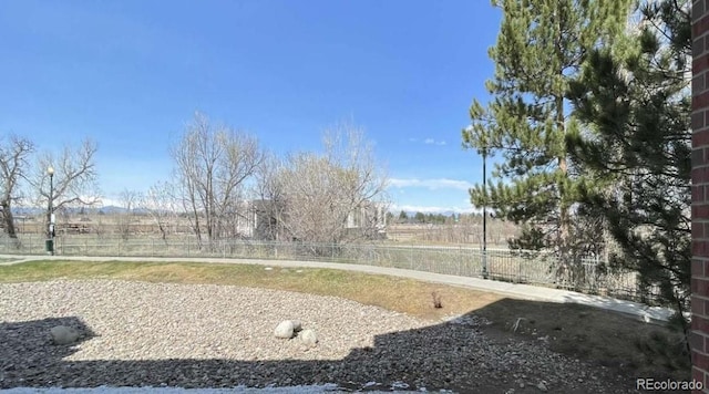 14333 E 1st Dr Unit 108, Aurora, CO 80011 - view of yard featuring fence
