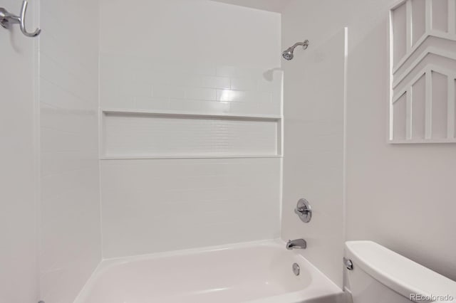 bathroom with toilet and tub / shower combination