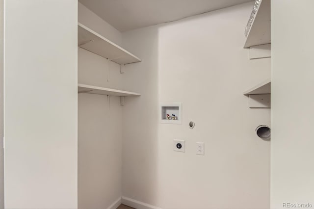 laundry area featuring washer hookup, electric dryer hookup, and baseboards