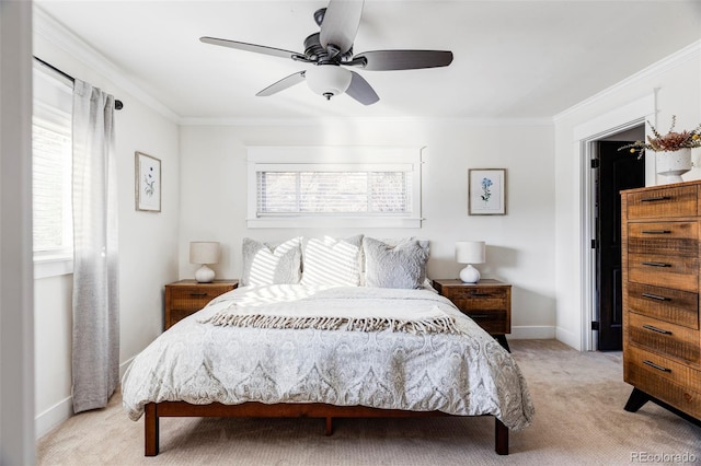 bedroom with ceiling fan, light colored carpet, and ornamental molding