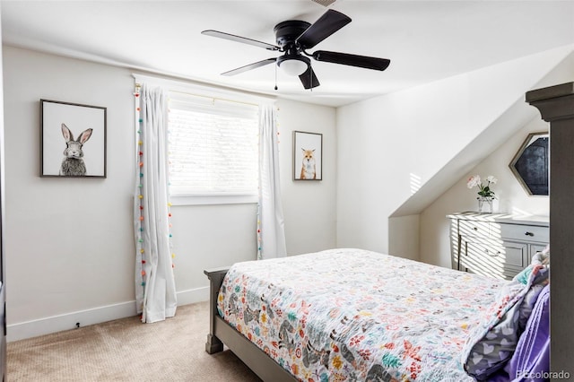 bedroom with ceiling fan and light colored carpet