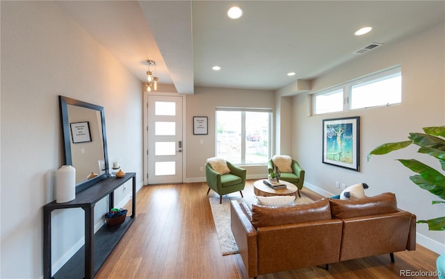 1355 Zenobia St, Denver, CO 80204 - living room featuring plenty of natural light, baseboards, recessed lighting, and wood finished floors