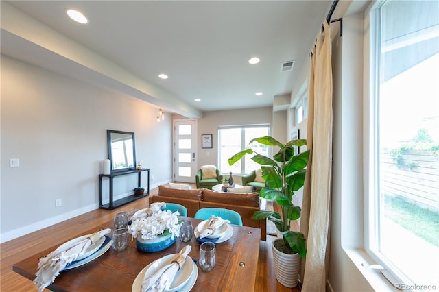 1355 Zenobia St, Denver, CO 80204 - dining space featuring recessed lighting, baseboards, and wood finished floors