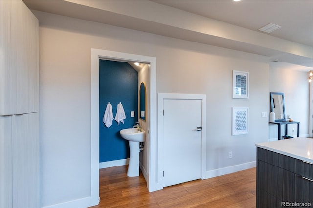 1355 Zenobia St, Denver, CO 80204 - corridor featuring baseboards and light wood-type flooring