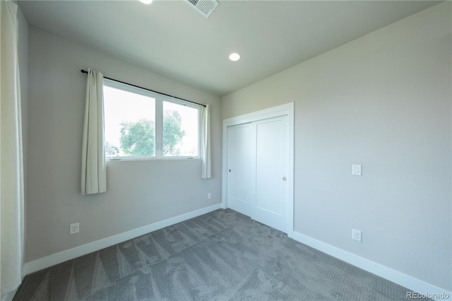 1355 Zenobia St, Denver, CO 80204 - unfurnished bedroom with baseboards, carpet flooring, recessed lighting, and a closet