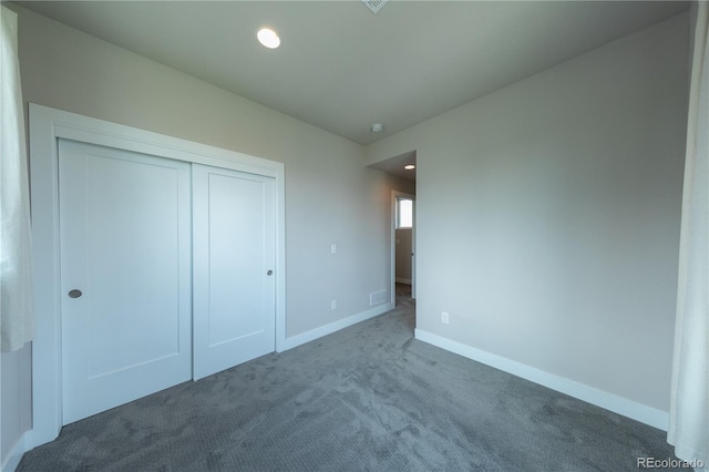 1355 Zenobia St, Denver, CO 80204 - unfurnished bedroom featuring carpet floors, baseboards, a closet, and recessed lighting