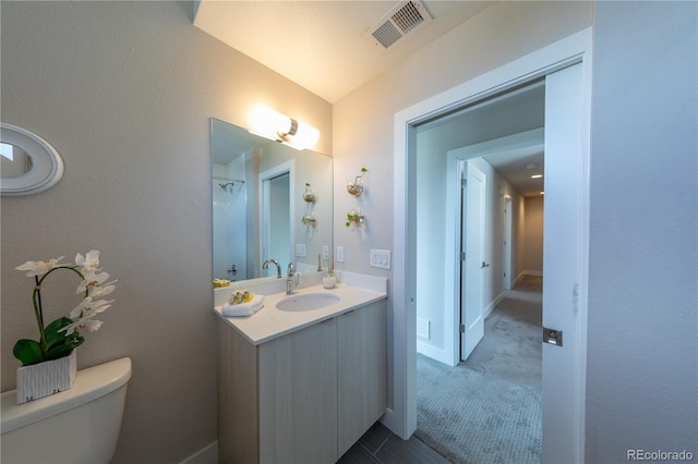 1355 Zenobia St, Denver, CO 80204 - full bathroom with toilet and vanity