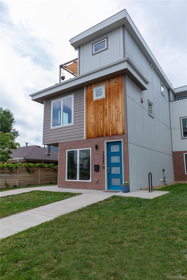1355 Zenobia St, Denver, CO 80204 - back of property featuring brick siding