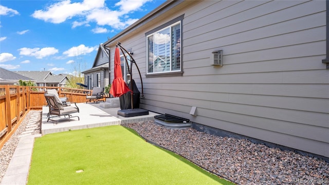 view of yard featuring a patio area and fence