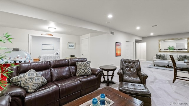 carpeted living room with recessed lighting