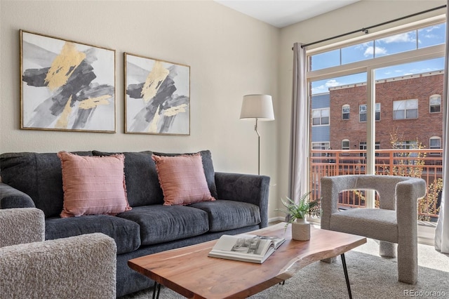 7883 W 55th Ave, Arvada, CO 80002 - living area featuring carpet floors