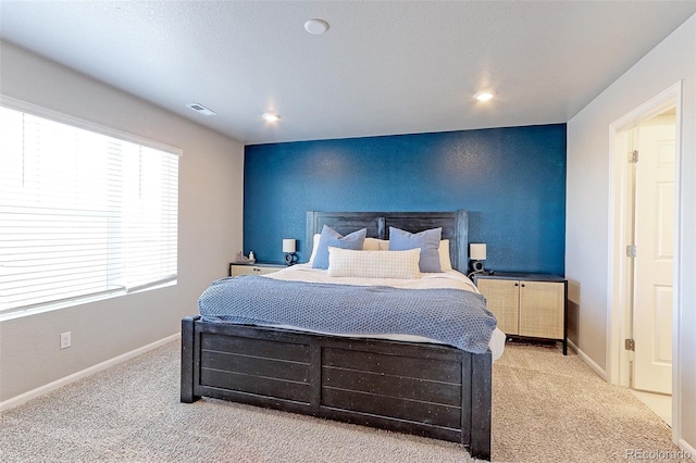 bedroom with carpet, baseboards, and recessed lighting