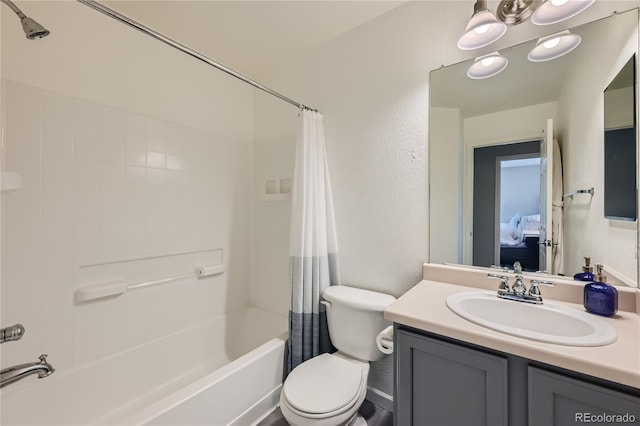1133 S Richfield St, Aurora, CO 80017 - full bath featuring shower / tub combo with curtain, vanity, and a textured wall