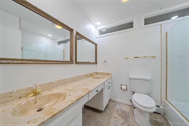 full bathroom featuring vanity, enclosed tub / shower combo, a baseboard heating unit, and toilet