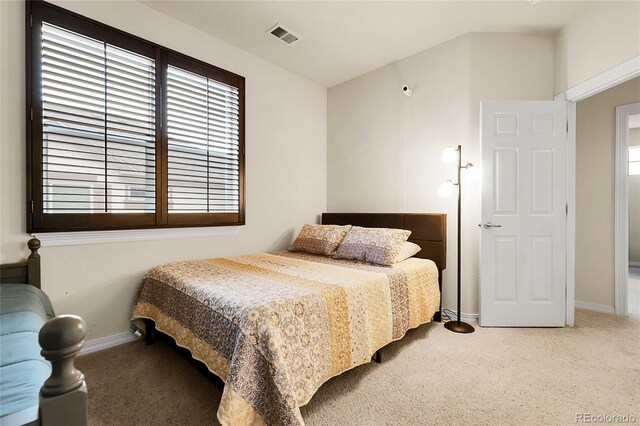 bedroom featuring carpet flooring and baseboards
