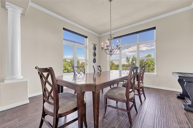 23965 E Kettle Pl, Aurora, CO 80016 - dining room with decorative columns, plenty of natural light, dark wood-type flooring, and crown molding
