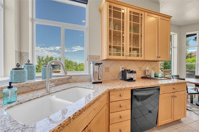 23965 E Kettle Pl, Aurora, CO 80016 - kitchen featuring black dishwasher, light brown cabinets, decorative backsplash, and a textured ceiling
