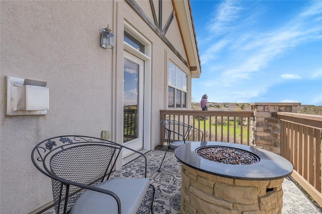 23965 E Kettle Pl, Aurora, CO 80016 - view of patio / terrace with a fire pit