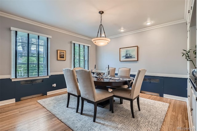 824 S Medea Way, Denver, CO 80209 - dining room featuring ornamental molding, light wood-type flooring, and baseboards