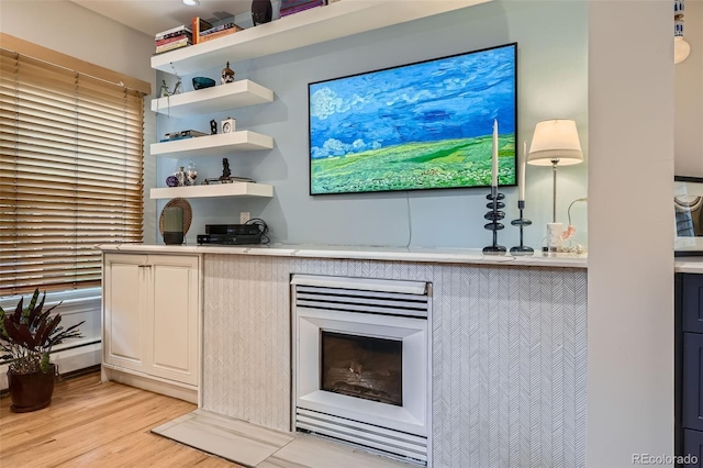 824 S Medea Way, Denver, CO 80209 - bar area featuring light wood-style floors