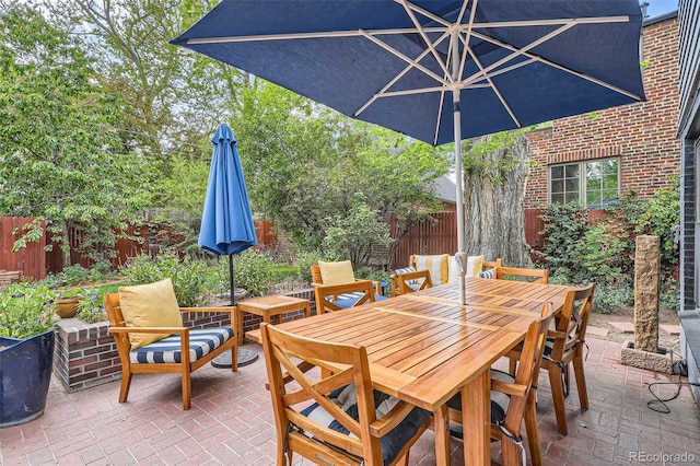 824 S Medea Way, Denver, CO 80209 - fenced backyard featuring outdoor dining area and a patio