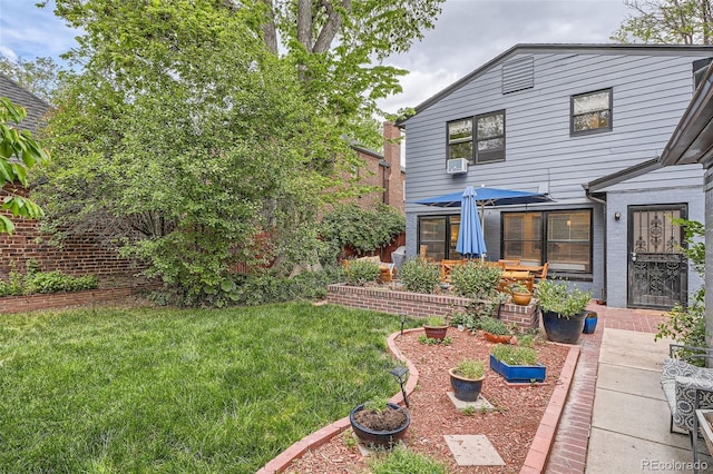 824 S Medea Way, Denver, CO 80209 - view of grassy yard with a vegetable garden