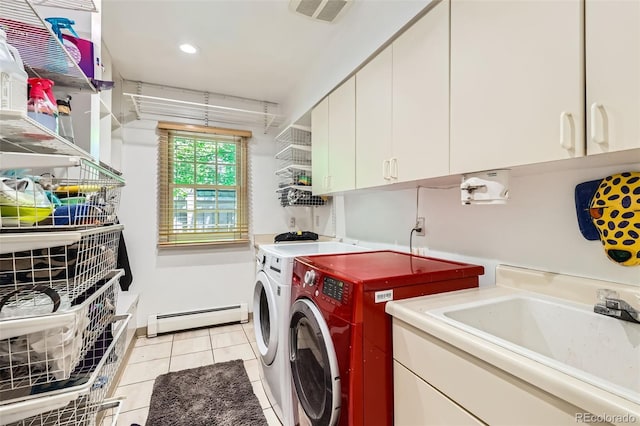 824 S Medea Way, Denver, CO 80209 - washroom featuring a baseboard heating unit, cabinet space, washing machine and dryer, light tile patterned flooring, and recessed lighting