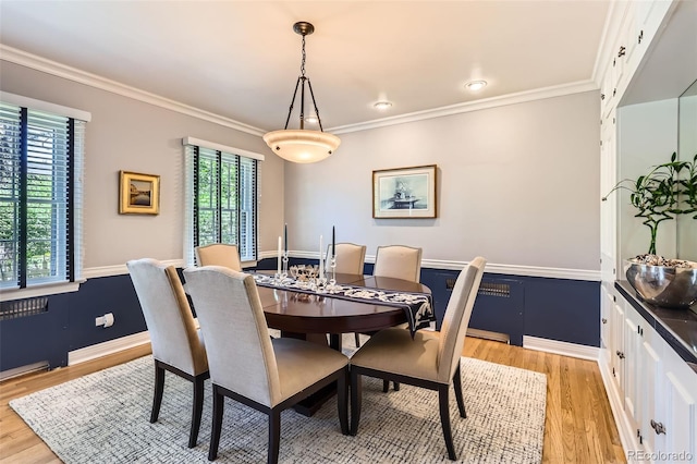 824 S Medea Way, Denver, CO 80209 - dining area with light wood-type flooring and crown molding